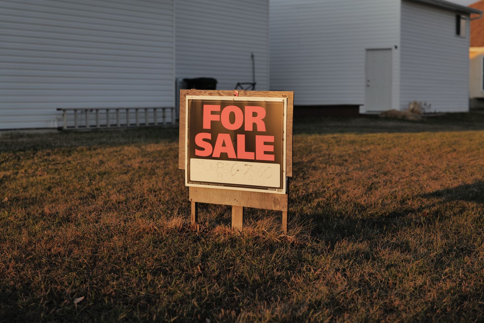 For sale sign in a suburban yard illustrating the best time to sell a house in Cary NC
