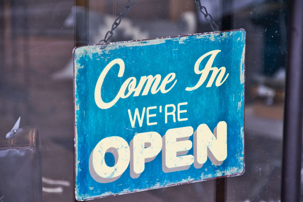 Open sign on a small business operating as a nonconforming use