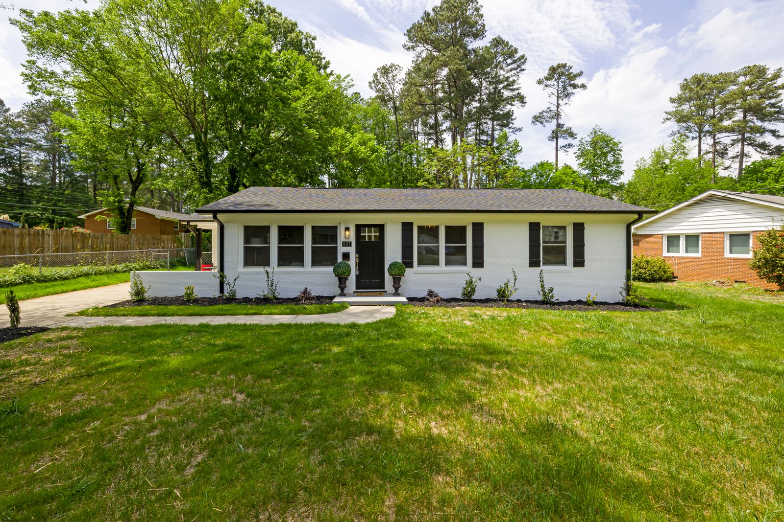 Single-story house with trees; deciding whether to sell your house and rent in retirement