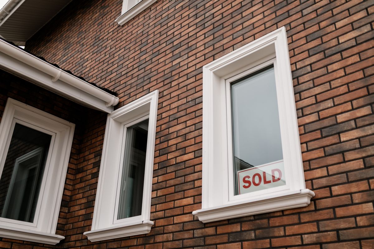 Sold sign on a home, pricing a home to sell in Cary NC